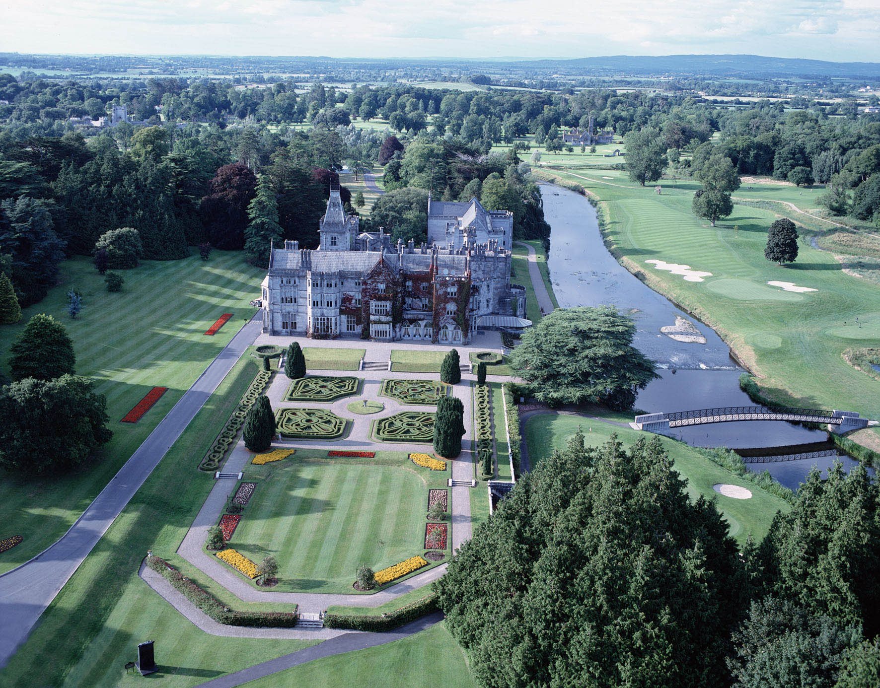 Aerial view of Adare Manor, its gardens, the River Maigue and the golf course